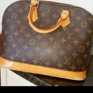 Authentic Louis Vuitton Alma bag.